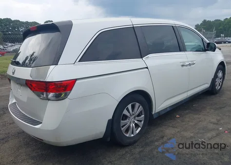 2014 Honda Odyssey Exl z USA, uszkodzony, nr VIN 5FNRL5H6XEB030376